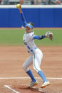 UCLA's Holly Azevedo (4) pitches in the first inning of an NCAA softball Women's College World Series game against Florida on Sunday, June 5, 2022, in Oklahoma City. (AP Photo/Alonzo Adams)