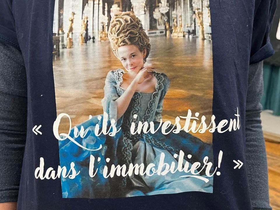 Sweaters depicted Quebec's housing minister to former French monarch Marie-Antoinette. 