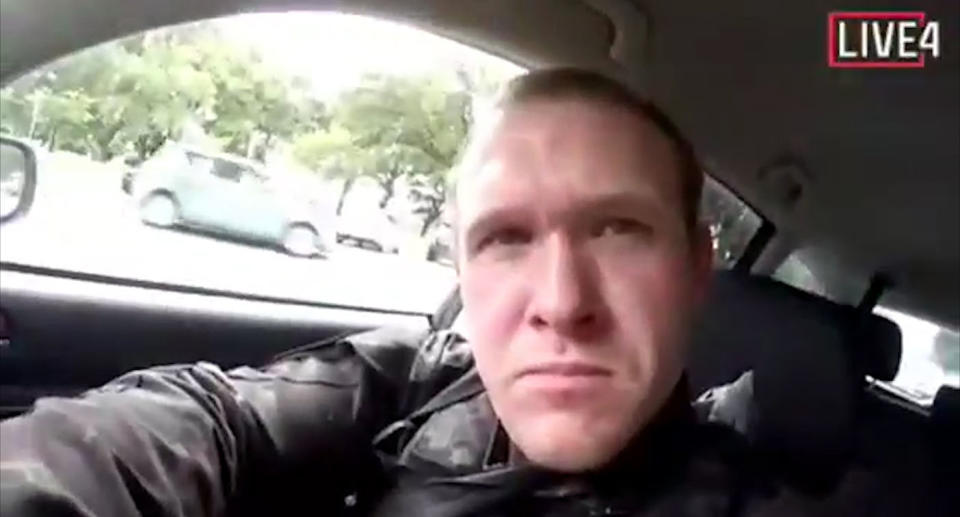 A frame from the live-stream video shows the gunman in a car before the mosque shootings in Christchurch, New Zealand. Source: Supplied via AP