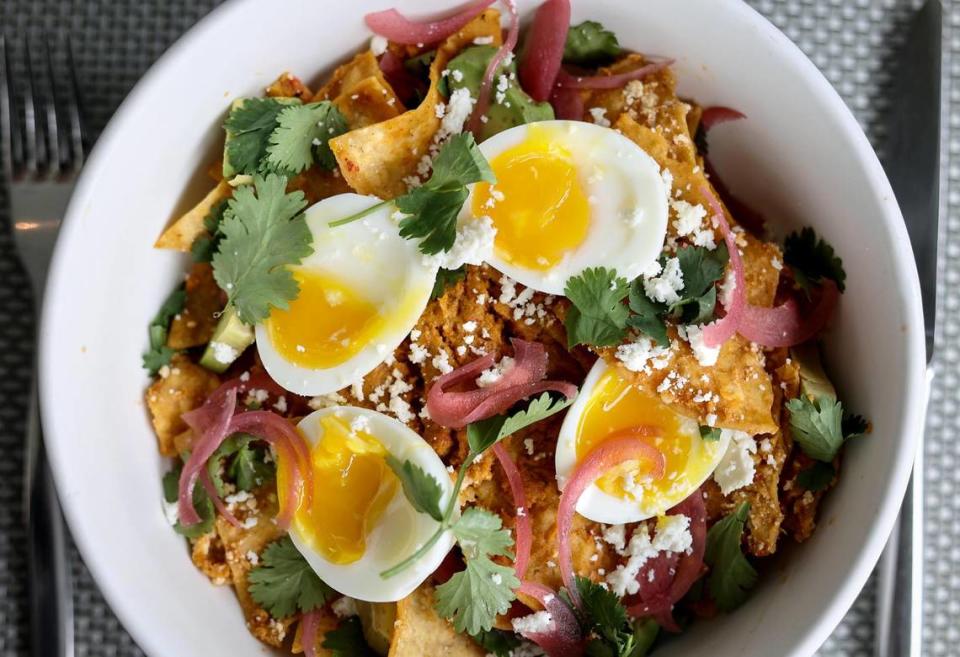 The birria chilaquiles at Cafe Modern feature guajillo chile-braised beef, poached eggs, queso fresco and black beans.