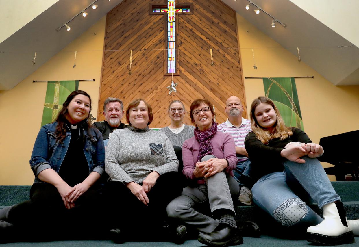 Pastor Dara Clifford, front row left to right, Sue DeVries, Julie Meitzen, Molly Paffenenroth and, back row, Jeff Otto, Jill Trentlage and Terry Wyngaard are part of a group of Christ the King Lutheran Church volunteers called the Good Neighbor Team. The group from the Combined Locks church is working to welcome a refugee family of eight into the Fox Valley. Not pictured but also part of the team: Jim and Kathy Weyers, Paul Gjerald, Jane Wyngaard and Pastor Nate Gauerke.