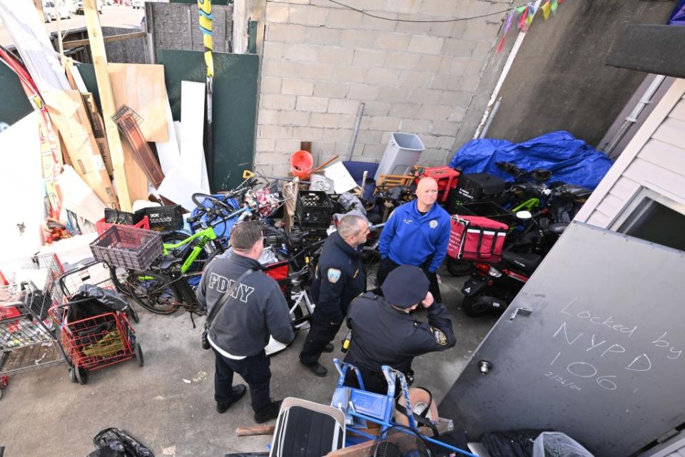 FDNY inspectors outside the illegal boarding house. Paul Martinka