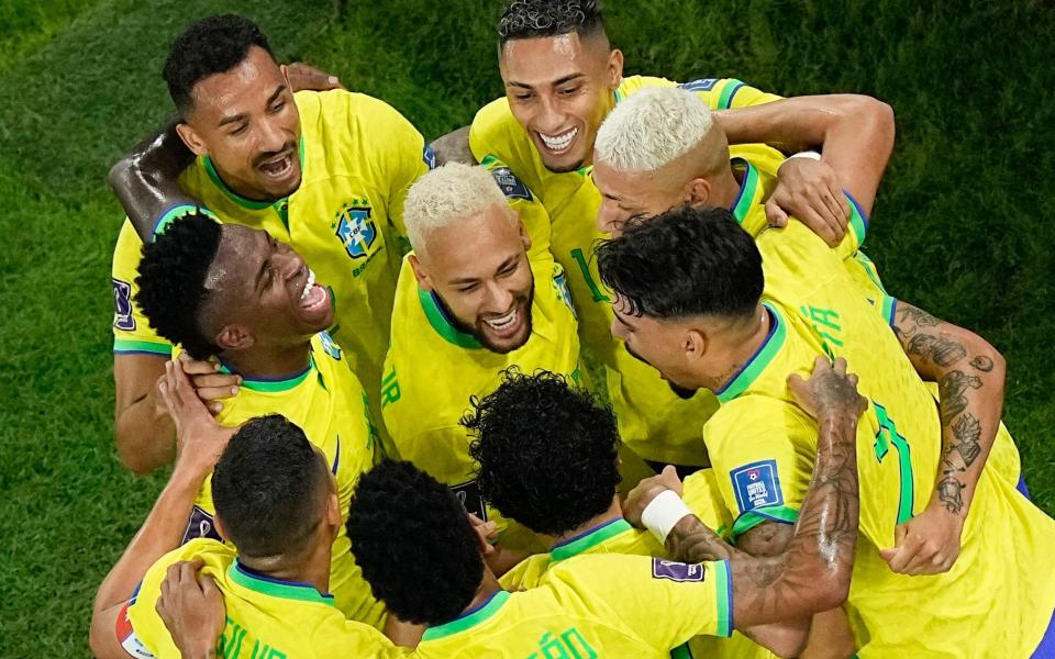 Teammates celebrate with Brazil's Neymar, - AP