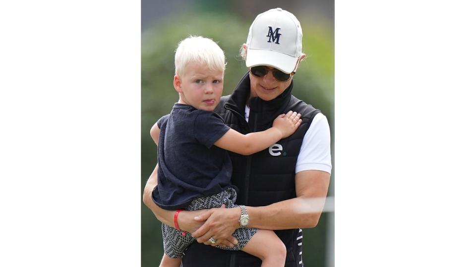 Zara dotes on her son