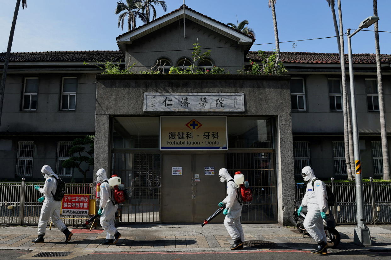 Soldiers disinfect Wanhua district, an area that has one of the most cases of coronavirus disease (COVID-19) in the city, in Taipei, Taiwan, May 16, 2021. REUTERS/Ann Wang     TPX IMAGES OF THE DAY