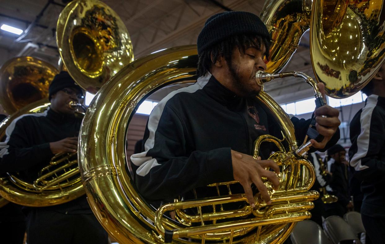 Micah Farr, a Renaissance High School marching band member, performs in front of a large crowd during the 8th annual Harvest Festival inside the University High School Academy's gymnasium in Detroit on Wednesday, Nov. 22, 2023.