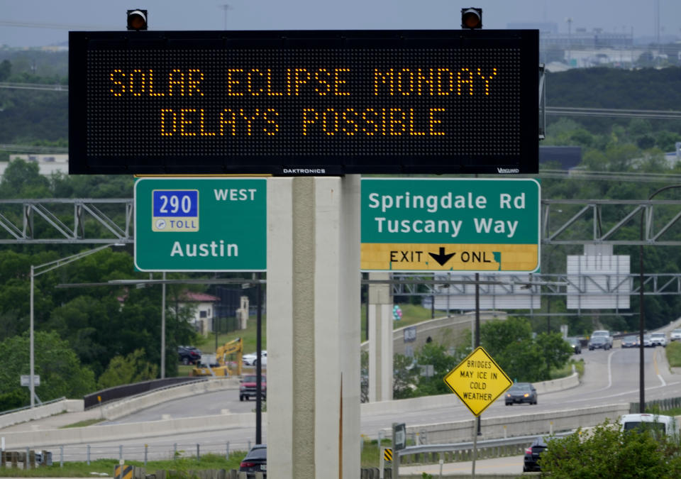 Motorists traveling toward Austin, Texas are reminded of Monday's eclipse and the possibility of traffic delays Saturday, April 6, 2024, in Austin. (AP Photo/Charles Rex Arbogast)