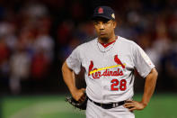 ARLINGTON, TX - OCTOBER 24: Octavio Dotel #28 of the St. Louis Cardinals stands on the mound in the eighth inning during Game Five of the MLB World Series against the Texas Rangers at Rangers Ballpark in Arlington on October 24, 2011 in Arlington, Texas. (Photo by Tom Pennington/Getty Images)