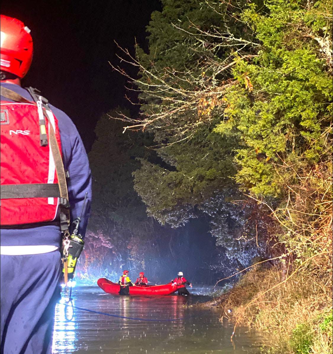 Members of the  Maury County Fire Department are dispatched to 2411 Rally Hill Road in Columbia to rescue two people swept downstream in their vehicle at about 7:30 p.m. on Wednesday, Jan. 19, 2022.