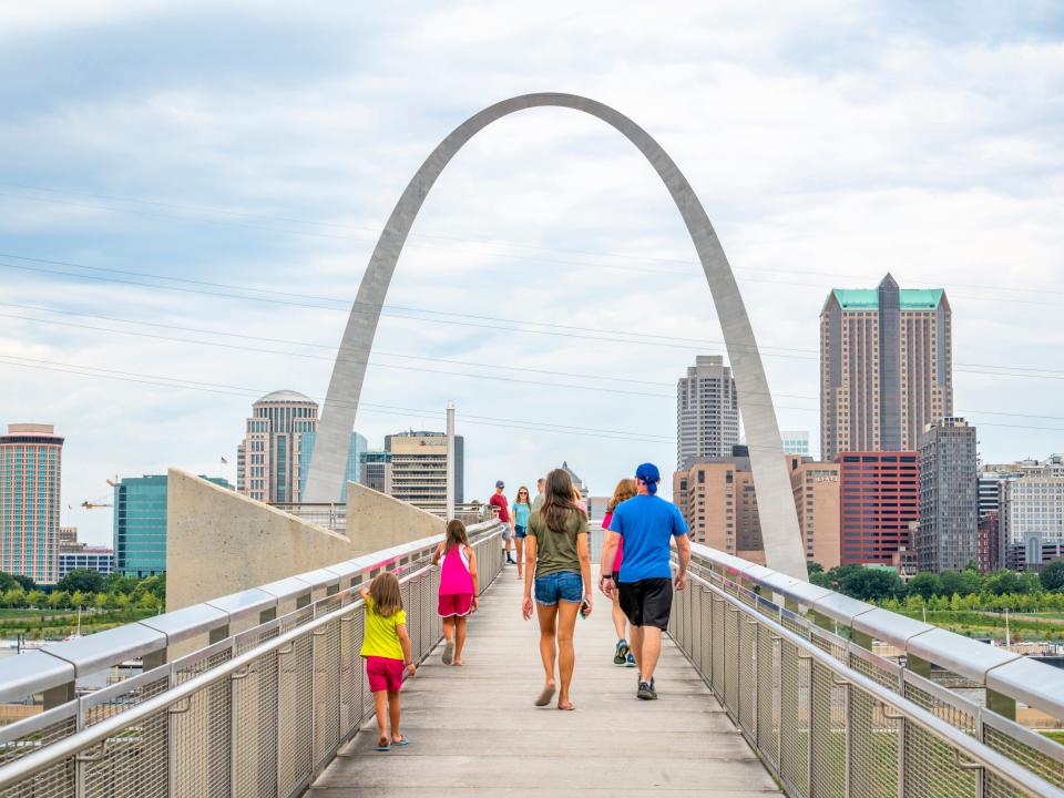 Family walking to the overlook of the Gateway Arch in St. Louis.