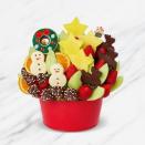 <p><strong>Edible Arrangements </strong></p><p>ediblearrangements.com</p><p><strong>$74.99</strong></p><p><a href="https://go.redirectingat.com?id=74968X1596630&url=https%3A%2F%2Fwww.ediblearrangements.com%2Ffruit-gifts%2Fholly-jolly-village-6193%3Ft%3D1600722464145%26ArrangementGroupID%3D281&sref=https%3A%2F%2Fwww.goodhousekeeping.com%2Fholidays%2Fgift-ideas%2Fg34054234%2Fbest-gift-baskets-for-women%2F" rel="nofollow noopener" target="_blank" data-ylk="slk:Shop Now;elm:context_link;itc:0;sec:content-canvas" class="link ">Shop Now</a></p><p>A fun twist on the traditional fruit basket, this cheery arrangement has reindeer-shaped pineapple covered in chocolate pineapple, citrus slices, delicious berries, melon, and much more. </p>