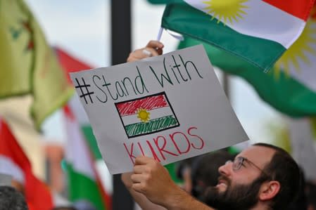 A crowd of over 500 people protest in support of Kurds after the Trump administration changed its policy in Syria