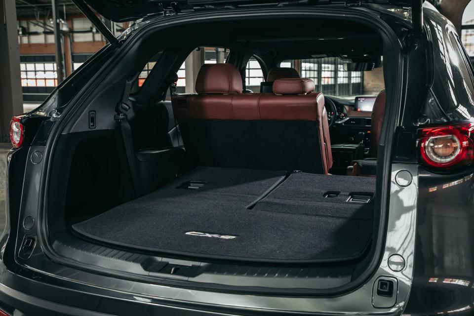 <p>But with 135 cubic feet of passenger space and up to 71 cubic feet of cargo room, the CX-9 may be considered small only by those who won’t be satisfied until they have far too much.</p>