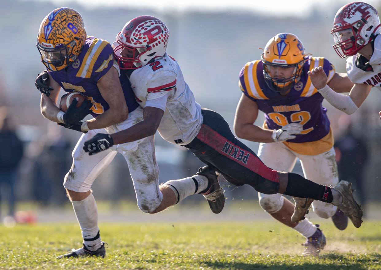 Hononegah's Stuart Hale runs in for a first down against Pekin at Hononegah High School on Saturday, Nov. 6, 2021, in Rockton.