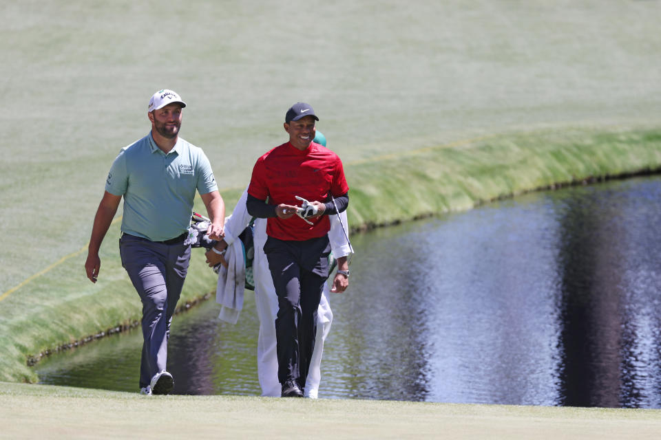 Jon Rahm and Tiger Woods, pictured here walking to the 16th green during the final round of the Masters.