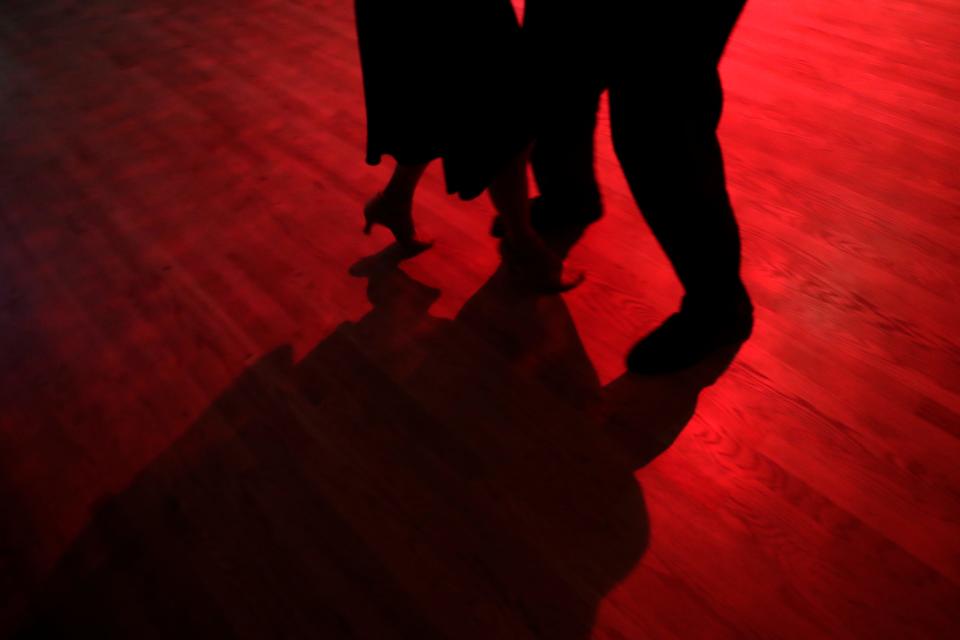 Couples spin around the dance floor to the music of the Tallahassee Swing Band at the American Legion Post 13 at Lake Ella Tuesday, July 9, 2019. The band has been performing at the post for 30 years. The oldest regular dancer in 99-years-old. 