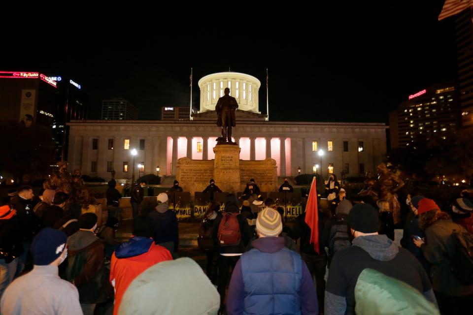 About 100 people gather during a protest to the Kyle Rittenhouse verdict outside of the Ohio Statehouse in Columbus, Ohio, on Friday, Nov. 19, 2021.