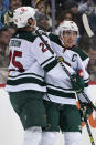 Minnesota Wild's Jared Spurgeon (46) celebrates after after scoring during the second period of an NHL hockey game against the Pittsburgh Penguins in Pittsburgh, Saturday, Nov. 6, 2021. (AP Photo/Gene J. Puskar)