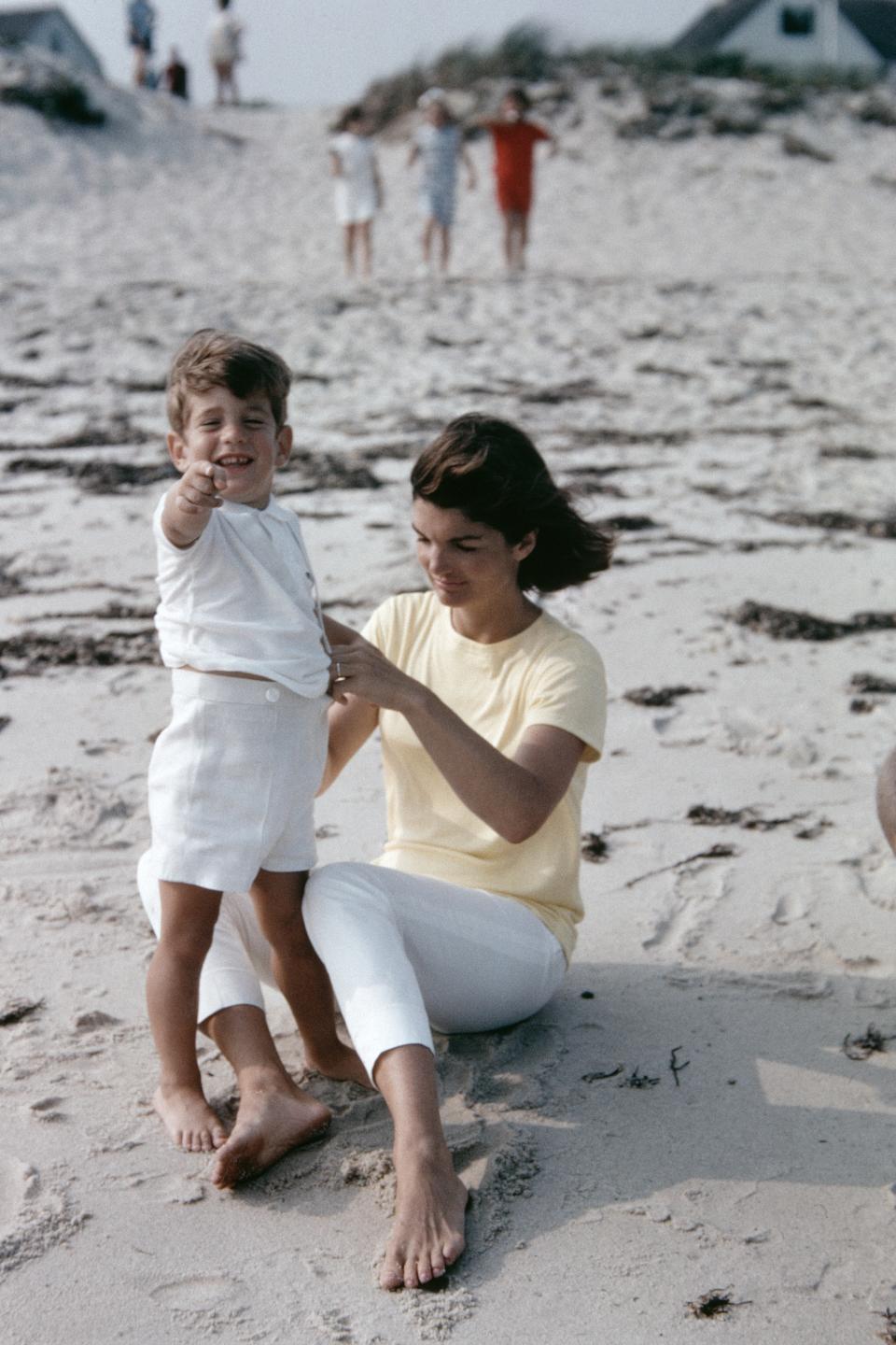 1964: Jackie O. makes the case for white denim.