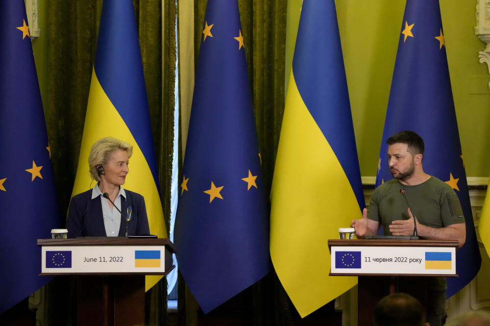 FILE - Ukraine President Volodymyr Zelenskyy speaks during a joint press conference with European Commission President Ursula von der Leyen, left, in Kyiv, Ukraine, Saturday, June 11, 2022. (AP Photo/Natacha Pisarenko, Filw)