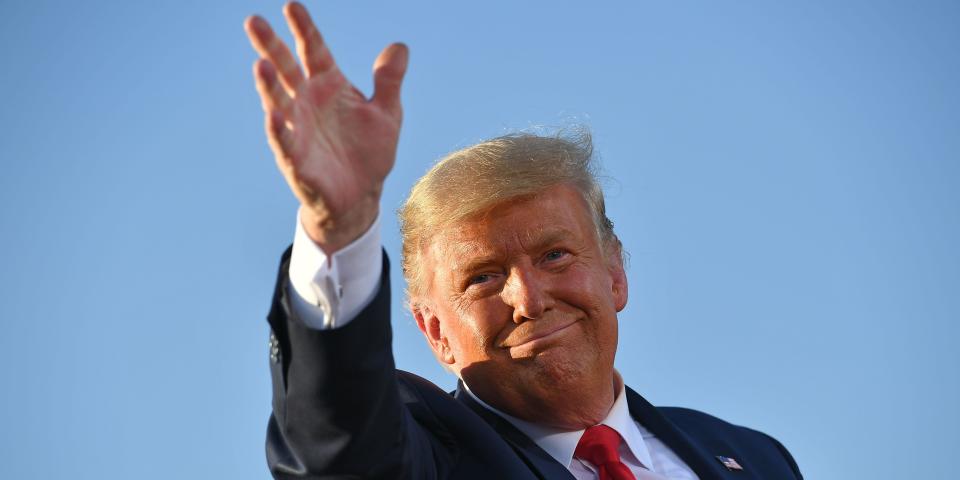 Donald Trump waves
