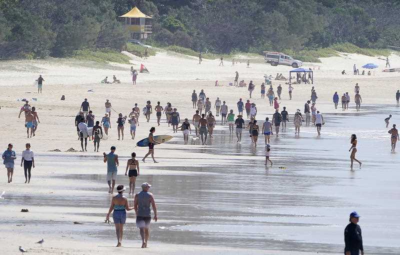 Crowds are seen at Burleigh Beach on the Gold Coast.