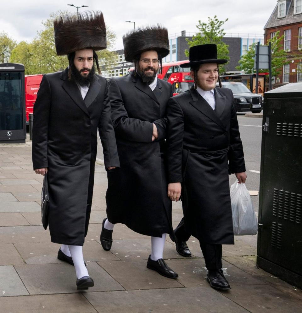 Orthodox Jews in traditional dress, seen in Stamford Hill