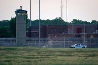 FILE PHOTO: A corrections vehicle patrols near the Federal Corrections Complex in Terre Haute