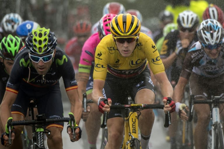 Spain's Alejandro Valverde (L) and Australia's Rohan Dennis ride in the pack during the second stage of the Tour de France on July 5, 2015