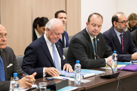 United Nations Special Envoy for Syria Staffan de Mistura attends a round of negotiations with the delegation of the Syrian Negotiation Commission (SNC) during the Intra Syria talks, at the European headquarters of the U.N. in Geneva, Switzerland December 14, 2017. REUTERS/Xu Jinquan/Pool