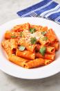 <p>It's surprisingly easy to whip up the addictive Italian staple in your own kitchen.</p><p>Get the recipe from <a href="https://www.delish.com/cooking/recipe-ideas/a26556220/penne-alla-vodka-recipe/" rel="nofollow noopener" target="_blank" data-ylk="slk:Delish;elm:context_link;itc:0;sec:content-canvas" class="link ">Delish</a>.</p>