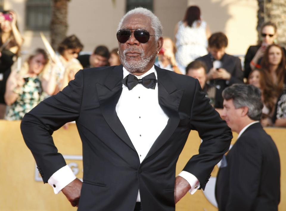 Actor Morgan Freeman arrives at the 20th annual Screen Actors Guild Awards in Los Angeles, California January 18, 2014. REUTERS/Lucy Nicholson (UNITED STATES Tags: ENTERTAINMENT)(SAGAWARDS-ARRIVALS)