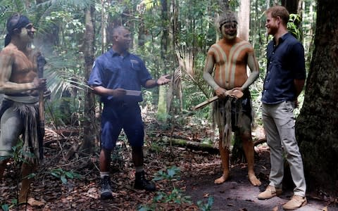 The Duke meets locals in the forests of Kagari - Credit: PHIL NOBLE /Reuters