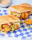 <p>If you've never had an iconic Louisiana po' boy, this fried shrimp version is a great place to start. Dressed with crunchy shredded iceburg, juicy tomatoes, and a creamy and briny remoulade sauce, this imposing sandwich will take you to the fern and Spanish moss-lined streets of <a href="https://www.delish.com/restaurants/g4169/best-classic-new-orleans-food/" rel="nofollow noopener" target="_blank" data-ylk="slk:NOLA" class="link ">NOLA</a>in seconds flat.<br><br>Get the <strong><a href="https://www.delish.com/cooking/recipe-ideas/a35591174/shrimp-po-boy-recipe/" rel="nofollow noopener" target="_blank" data-ylk="slk:Shrimp Po’ Boy recipe" class="link ">Shrimp Po’ Boy recipe</a></strong>. </p>