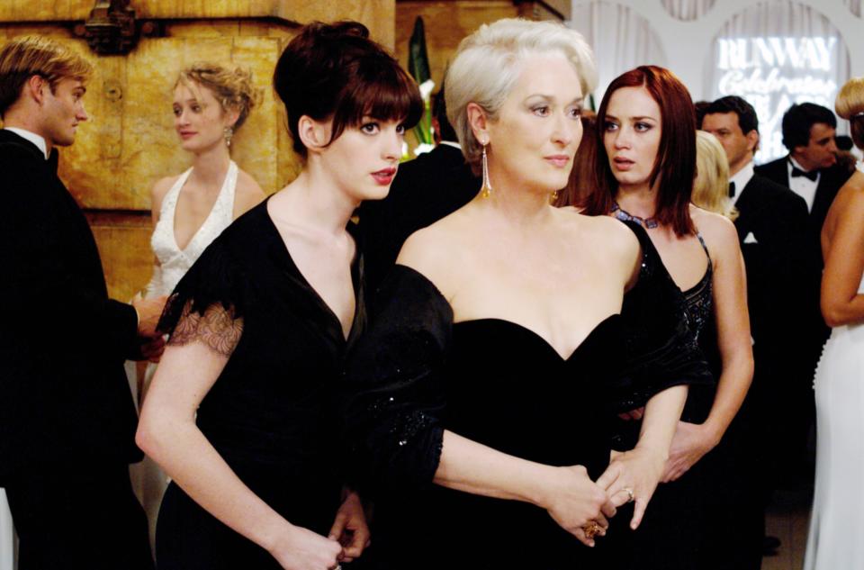 <h1 class="title">Anne Hathaway, Meryl Streep, and Emily Blunt as Andrea Sachs, Miranda Priestly, and Emily Charlton in 2006's THE DEVIL WEARS PRADA</h1><cite class="credit">©20thCentFox/Courtesy Everett Collection</cite>