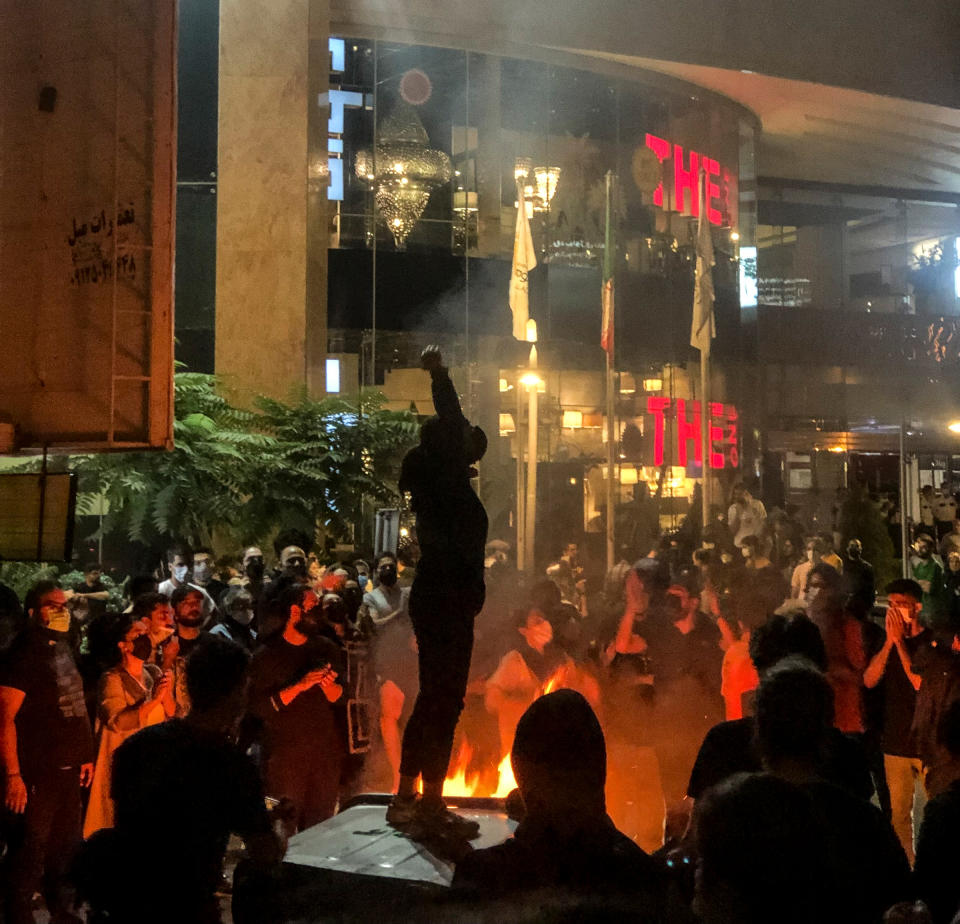 People gather during a protest for Mahsa Amini in Tehran on Sept. 22.<span class="copyright">Iranwire/Middle East Images/Redux</span>