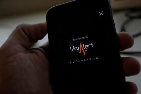 FILE PHOTO: The logo of SkyAlert earthquake alerts application is seen on a phone screen in this October 6, 2017 illustration photo. REUTERS/Daniel Becerril/Illustration/File Photo