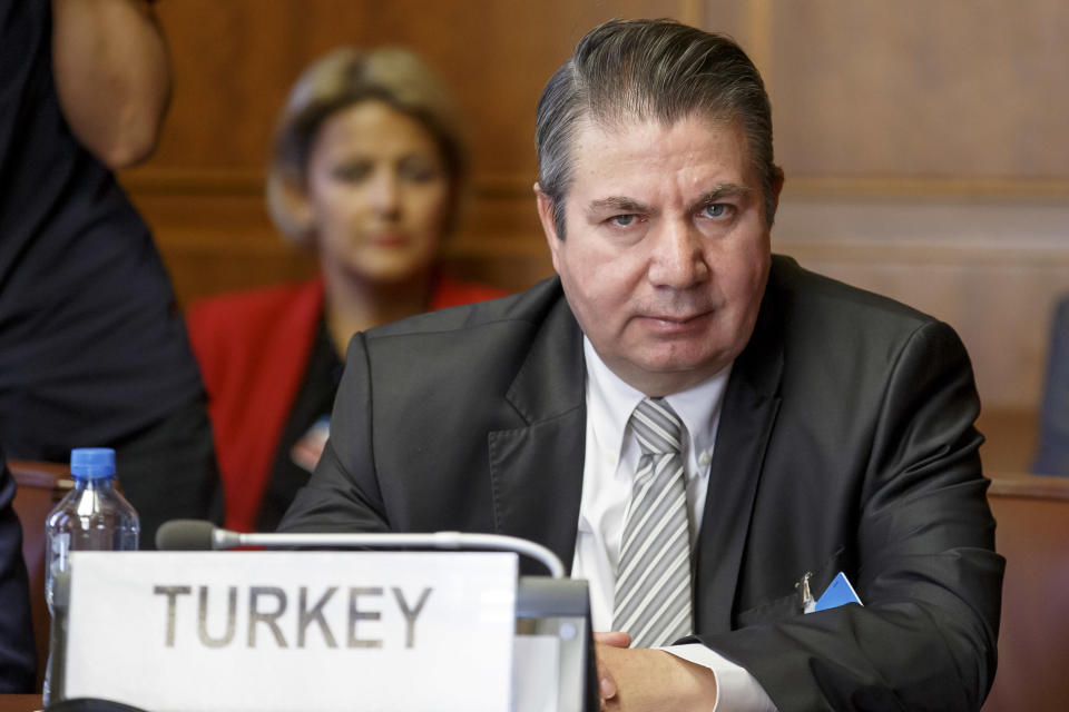 Turkish Foreign Ministry Deputy Sedat Onal attends a meeting during the consultations on Syria, at the European headquarters of the United Nations in Geneva, Switzerland, Tuesday, Sept. 11, 2018. Representatives of Russia, Turkey and Iran, meet with the UN Special Envoy of the Secretary-General for Syria to discuss the situation in Syria. (Salvatore Di Nolfi/Keystone via AP, Pool)