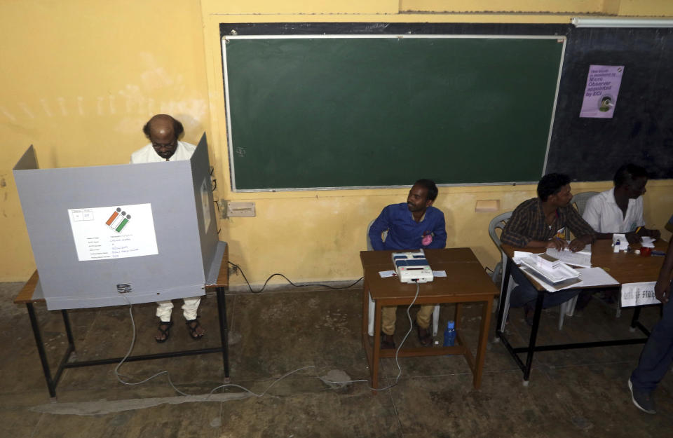 Indian superstar Rajnikanth arrives to cast his vote during the second phase of India's general elections in Chennai, India, Thursday, April 18, 2019. The Indian election is taking place in seven phases over six weeks in the country of 1.3 billion people. Some 900 million people are registered to vote for candidates to fill 543 seats in India's lower house of Parliament. (AP Photo/R. Parthibhan)