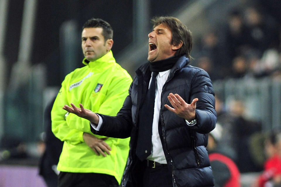 Juventus coach Antonio Conte gestures during a Serie A soccer match between Juventus and Inter Milan at the Juventus stadium, in Turin, Italy, Sunday, Feb. 2, 2014. (AP Photo/Massimo Pinca)