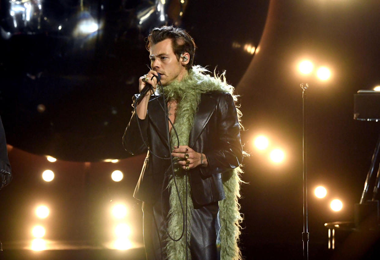 Harry Styles might just start a trend with boas at the Grammy's. (Photo by Kevin Winter/Getty Images for The Recording Academy)