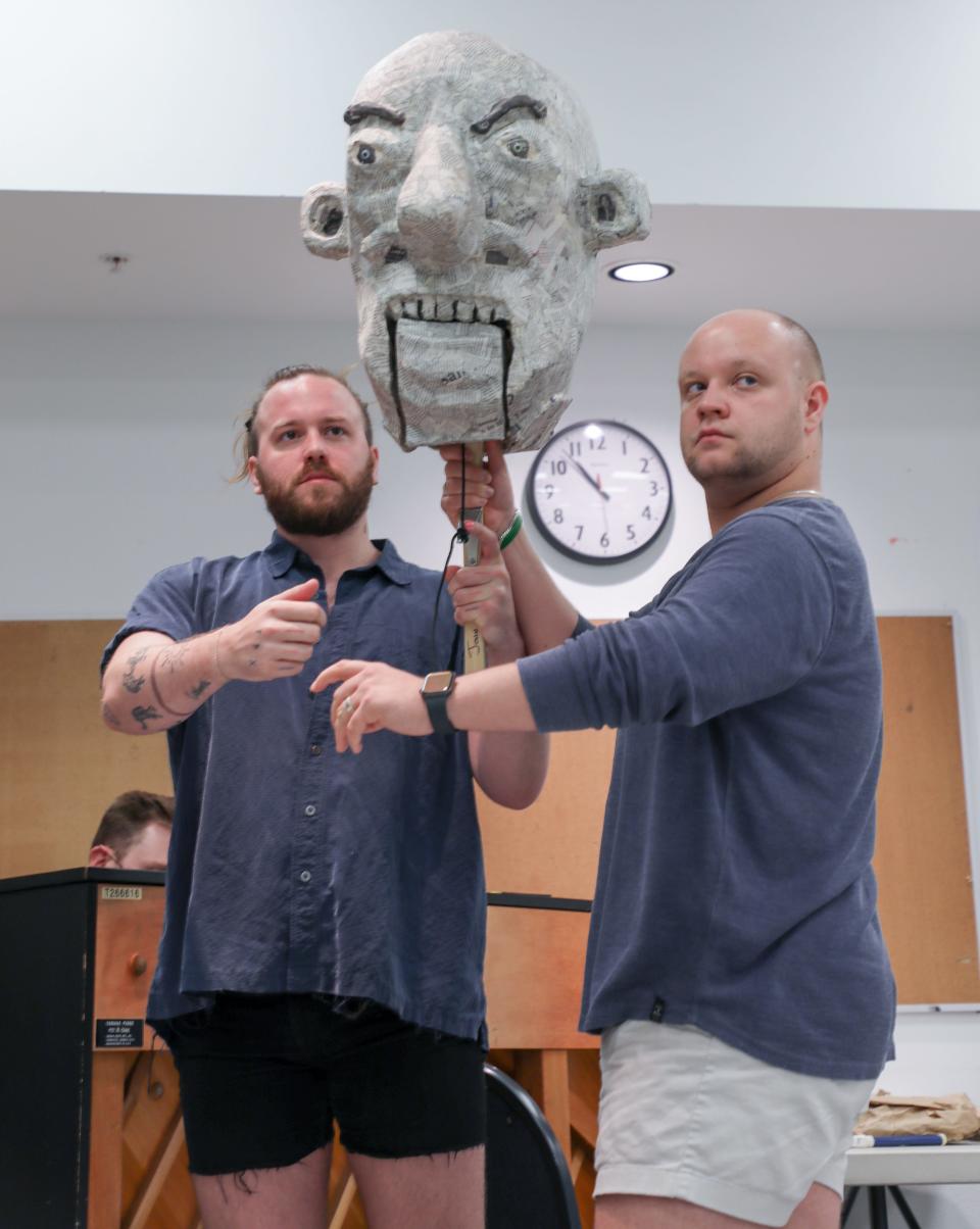 Zachary Francis Stewart and Luke Anthony Neville rehearse with one of the puppets featured in the new musical “Hood” at Asolo Repertory Theatre.