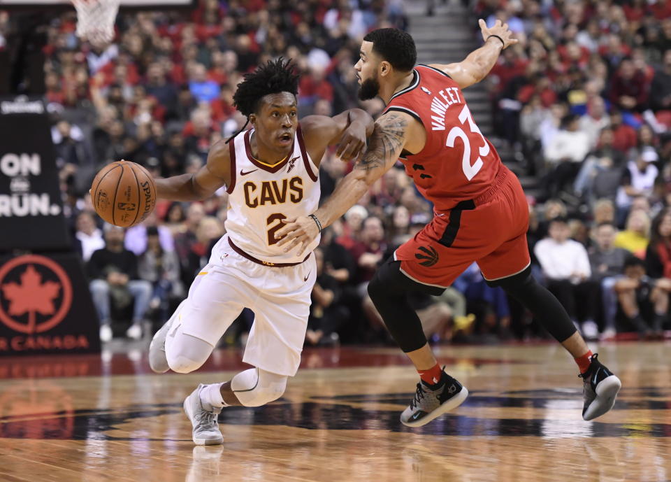Cleveland Cavaliers guard Collin Sexton (2) drives towards the basket as Toronto Raptors guard Fred VanVleet (23)defends during second half NBA basketball action in Toronto on Wednesday, Oct. 17, 2018. (Nathan Denette/The Canadian Press via AP)