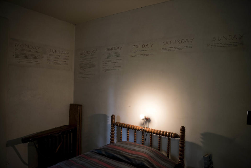 The outline of a book written on the walls in the William Faulkner House.