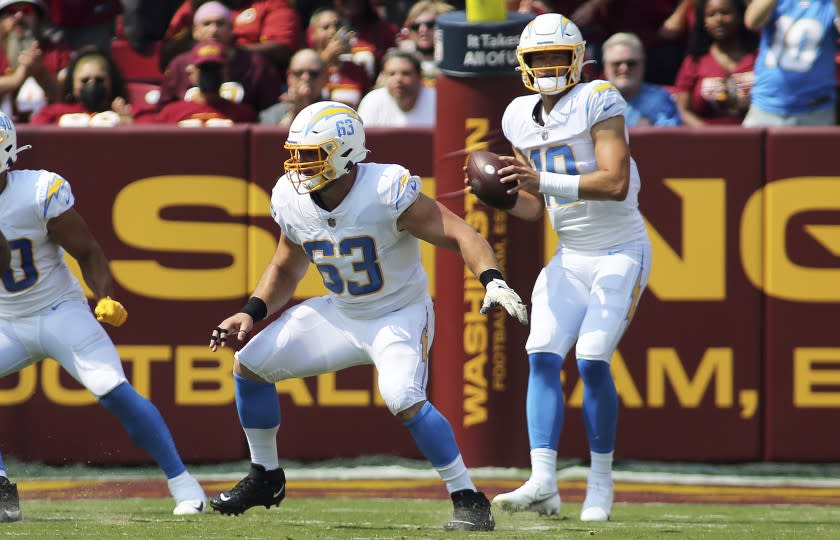 Los Angeles Chargers center Corey Linsley (63) blocks during an NFL football game against the Washington Football Team, Sunday, Sept. 12, 2021 in Landover, Md. (AP Photo/Daniel Kucin Jr.)