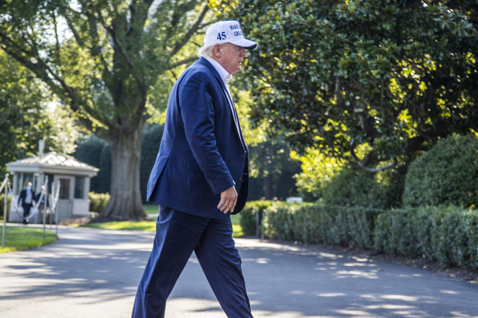 President Donald Trump arrives at the White House from a weekend trip to Bedminster, N.J., Sunday, July 26, 2020, in Washington. (AP Photo/Manuel Balce Ceneta)