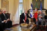 Israeli Prime Minister Benjamin Netanyahu and Portuguese Prime Minister Antonio Costa, right, meet at the Sao Bento palace in Lisbon Thursday, Dec. 5, 2019. (AP Photo/Armando Franca)