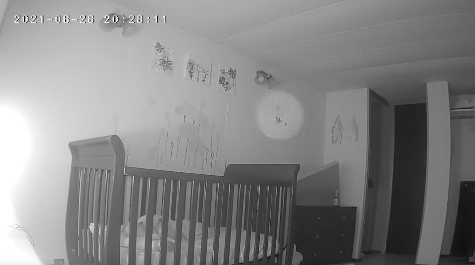 The white circle can be seen on the baby monitor hovering near the child's crib. Source: Jam Press/Australscope