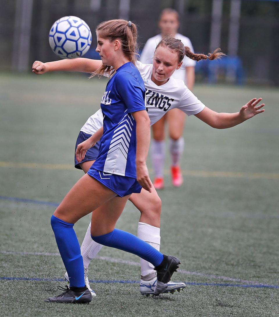 Norwell's Paige Flanders, foreground, and East Bridgewater's Chloe Lang fight for a loose ball. The Clippers and Vikings played to a 2-2 tie at Norwell on Monday, Sept. 12, 2022.