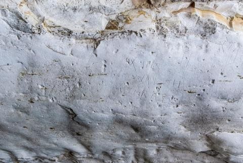 During World War Two, soldiers scrawled a message across the ceiling of an ancient water cistern.